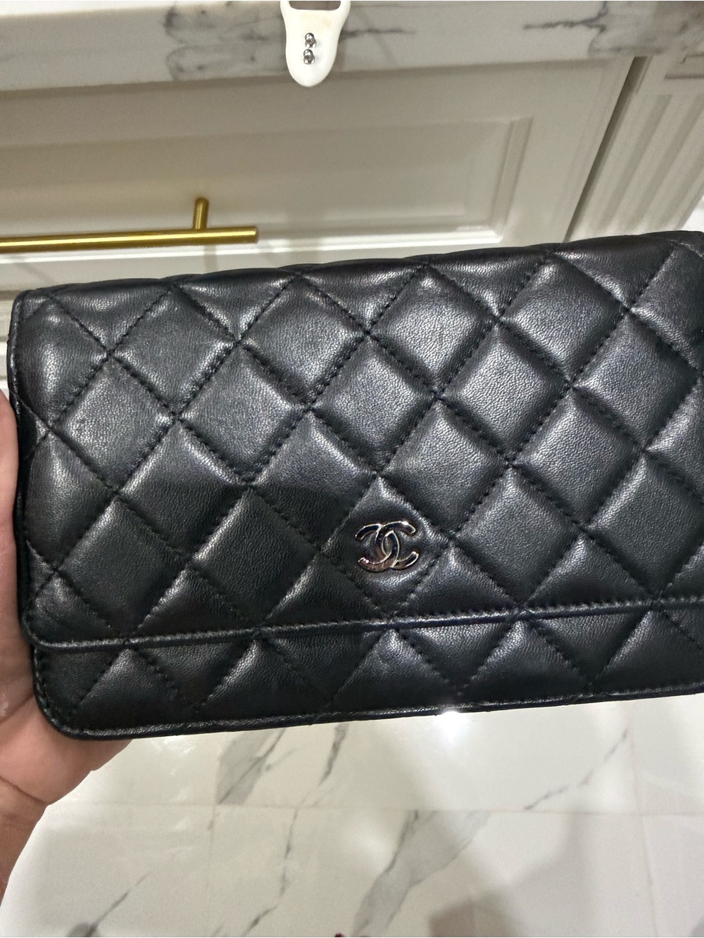 CHANEL Black Quilted Leather Clutch with CC Logo